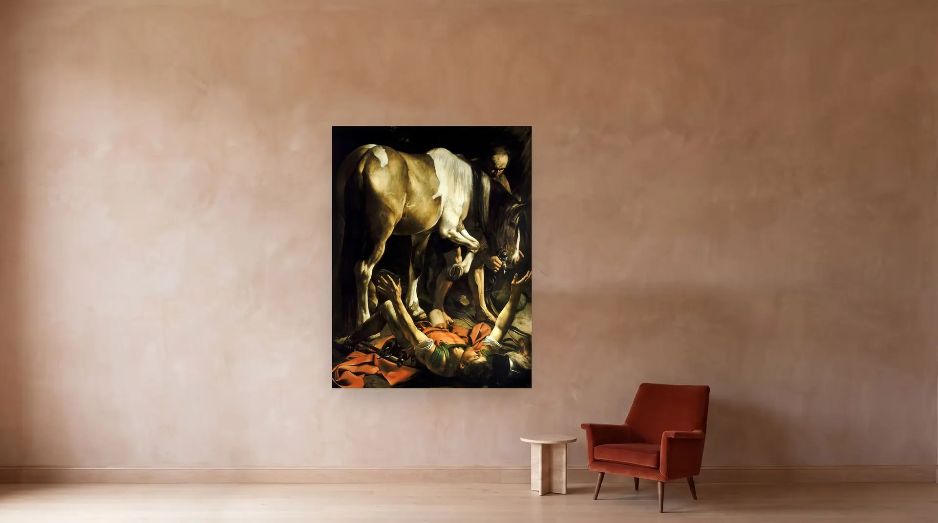 Conversion on the Way to Damascus by Caravaggio shown at its true size, 69" × 90½", beside an armchair