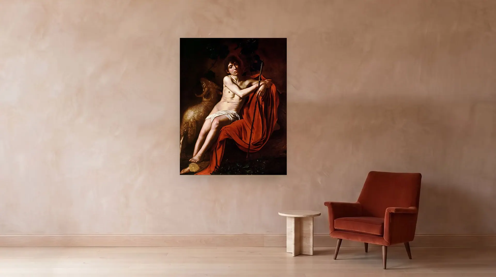 Saint John the Baptist by Caravaggio shown at its true size, 49" × 62½", beside an armchair