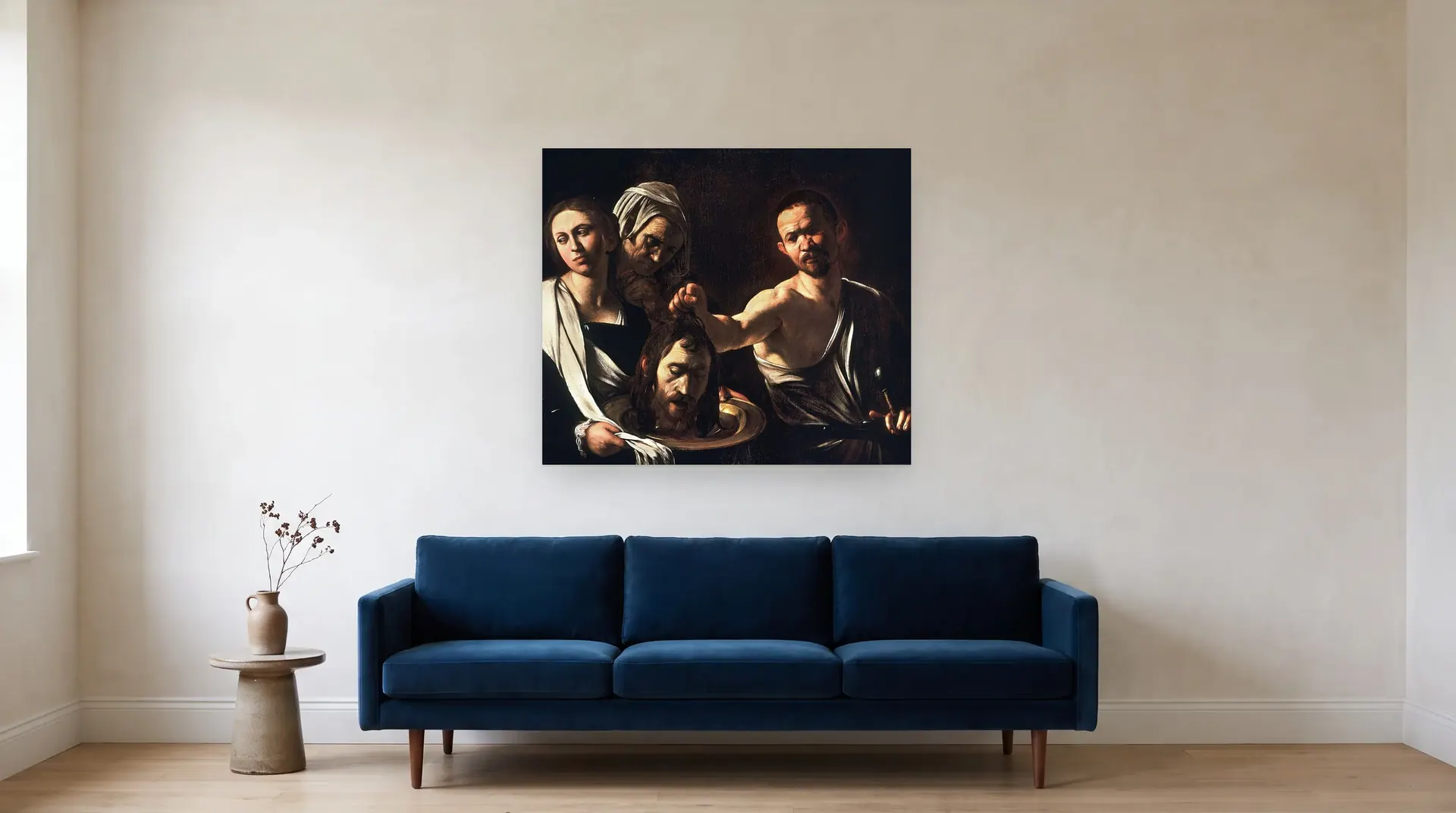 Salome with the Head of John the Baptist by Caravaggio shown at its true size, 42" × 36", over an 84" sofa