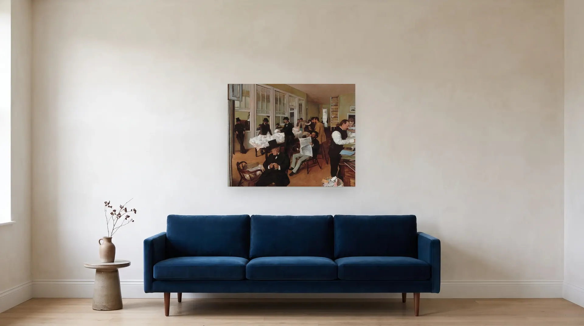 A Cotton Office in New Orleans by Edgar Degas shown at its true size, 36" × 29", over an 84" sofa