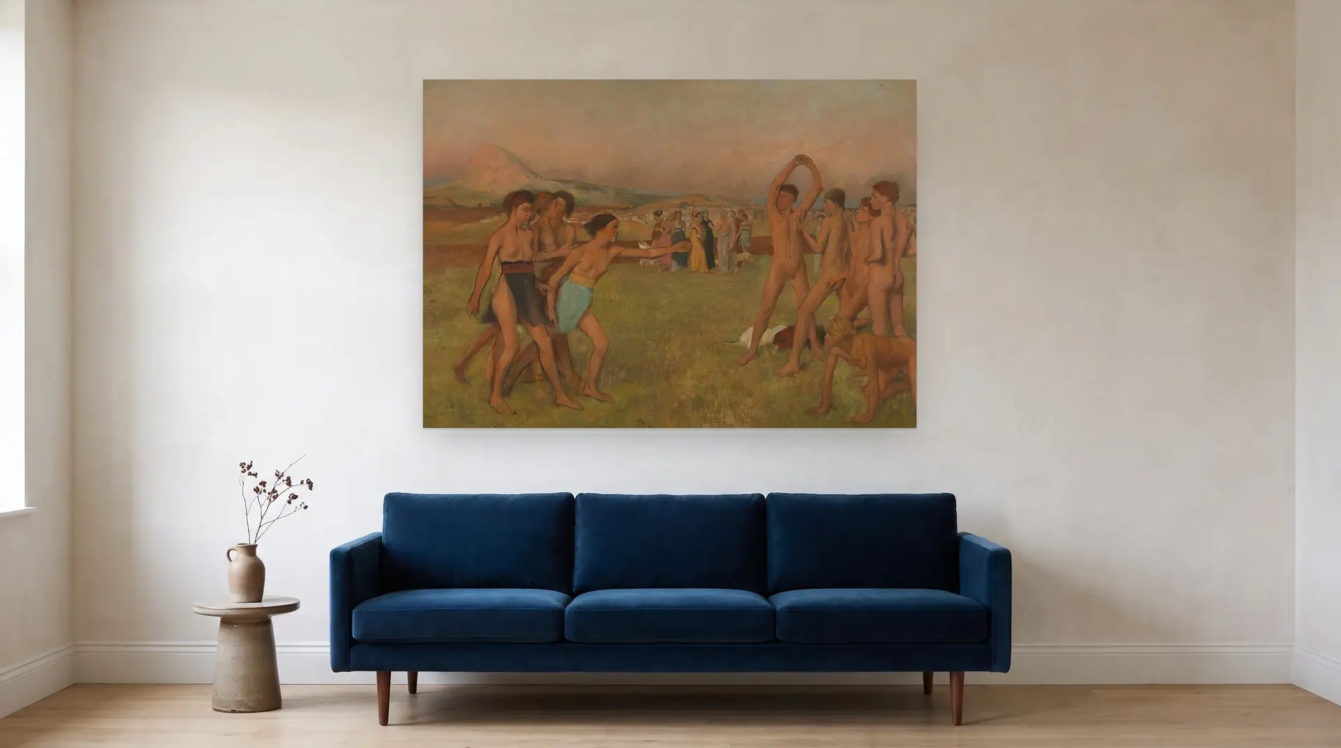 Young Spartans Exercising by Edgar Degas shown at its true size, 61" × 43", over an 84" sofa