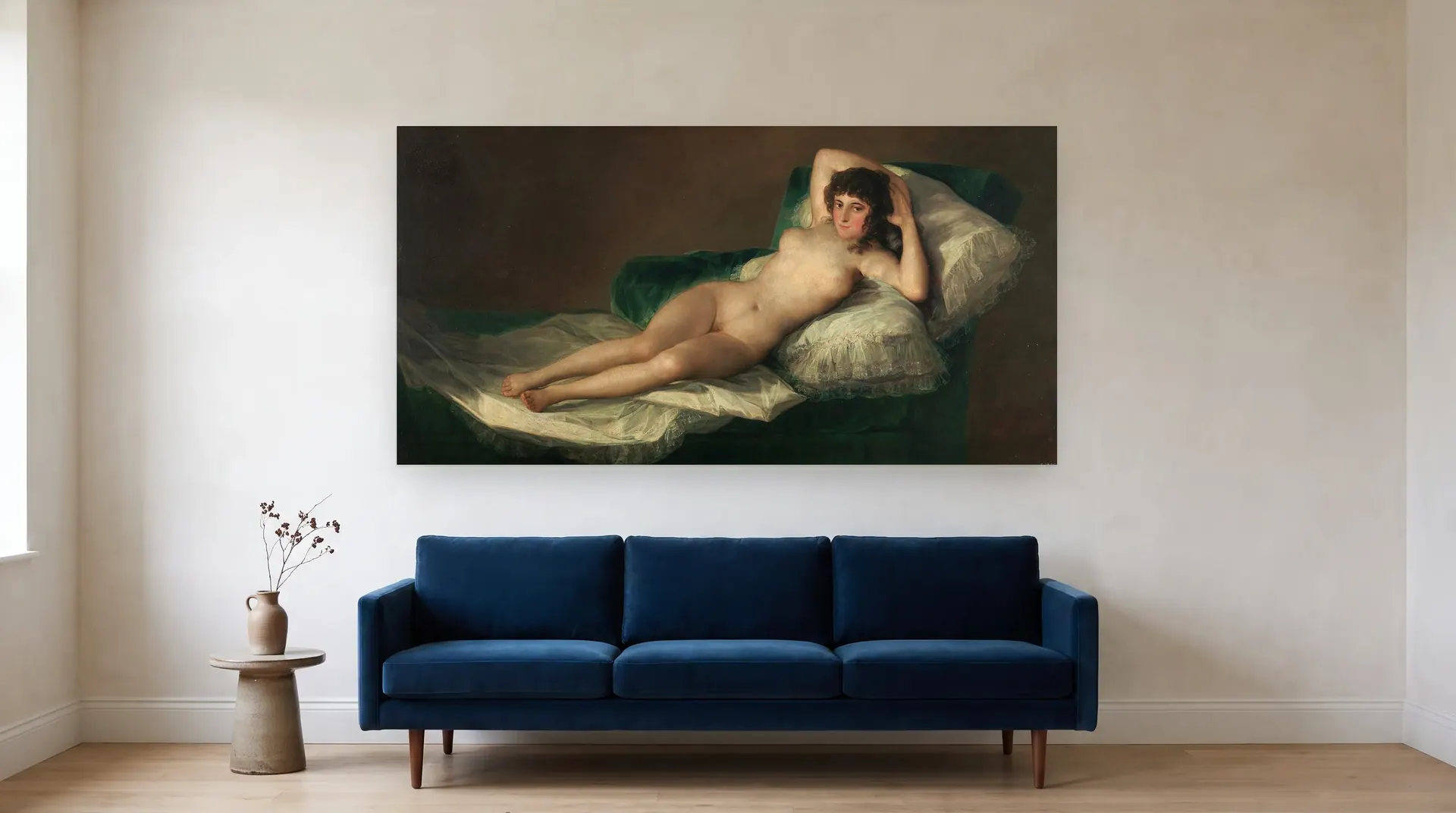 La maja desnuda by Francisco Goya shown at its true size, 75" × 38½", over an 84" sofa