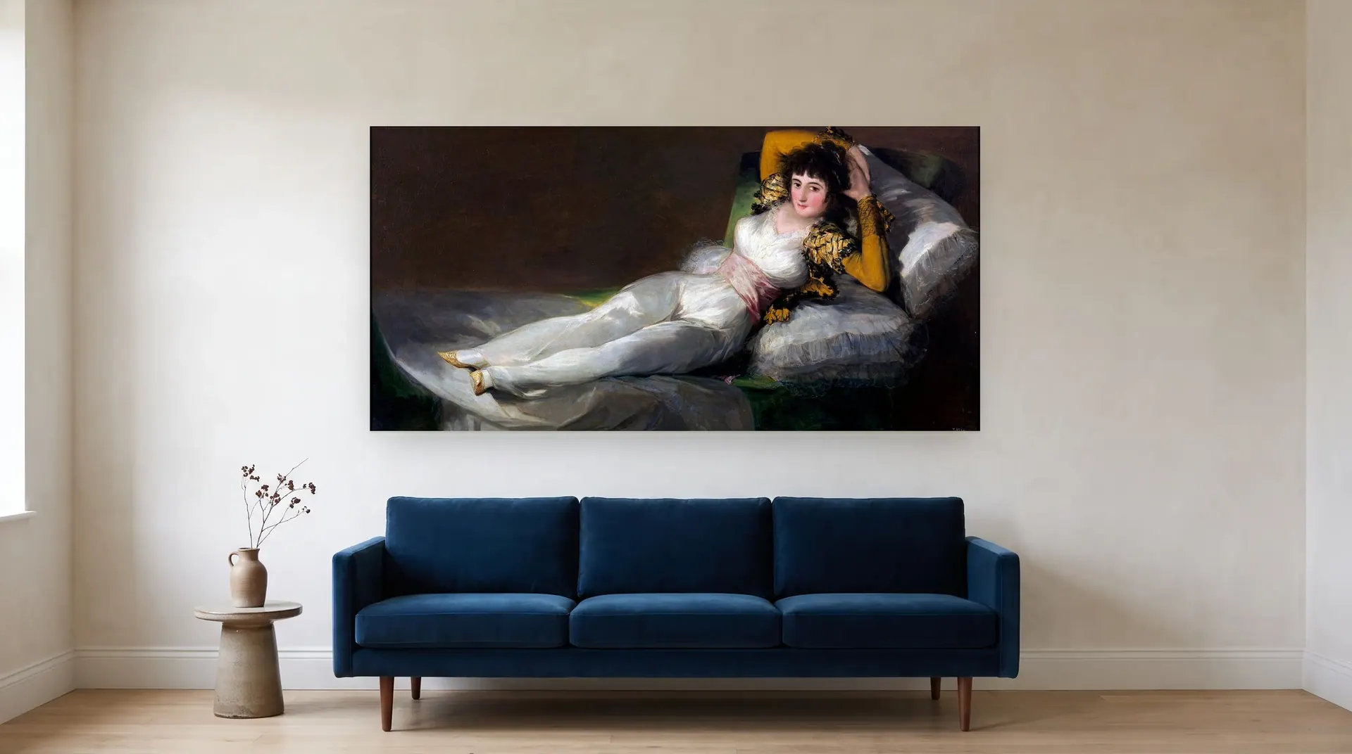 The Clothed Maja by Francisco Goya shown at its true size, 75" × 37½", over an 84" sofa