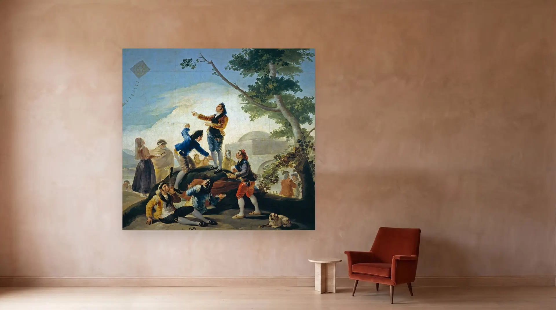 The Kite by Francisco Goya shown at its true size, 112" × 106", beside an armchair