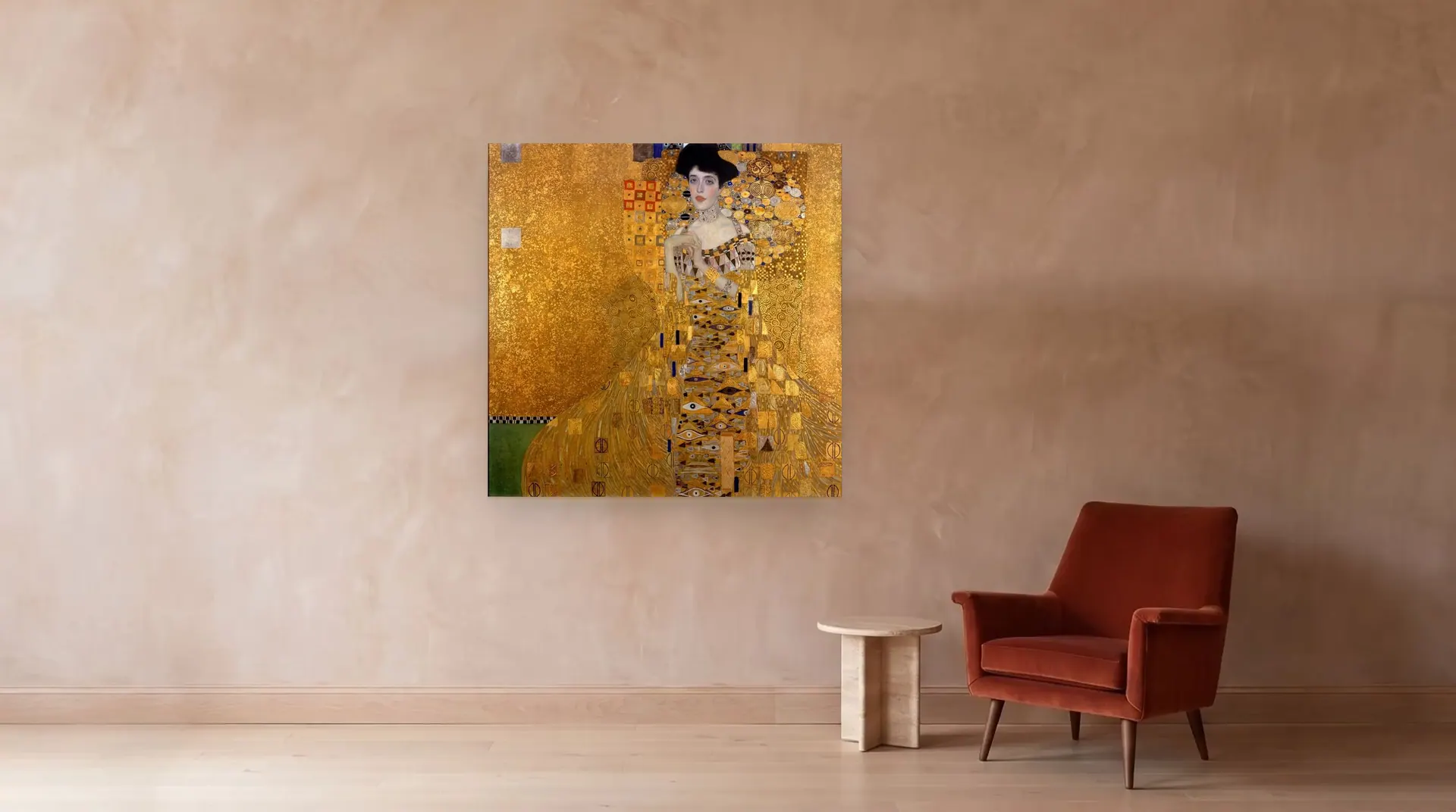 Portrait of Adele Bloch-Bauer I by Gustav Klimt shown at its true size, 55" × 55", beside an armchair