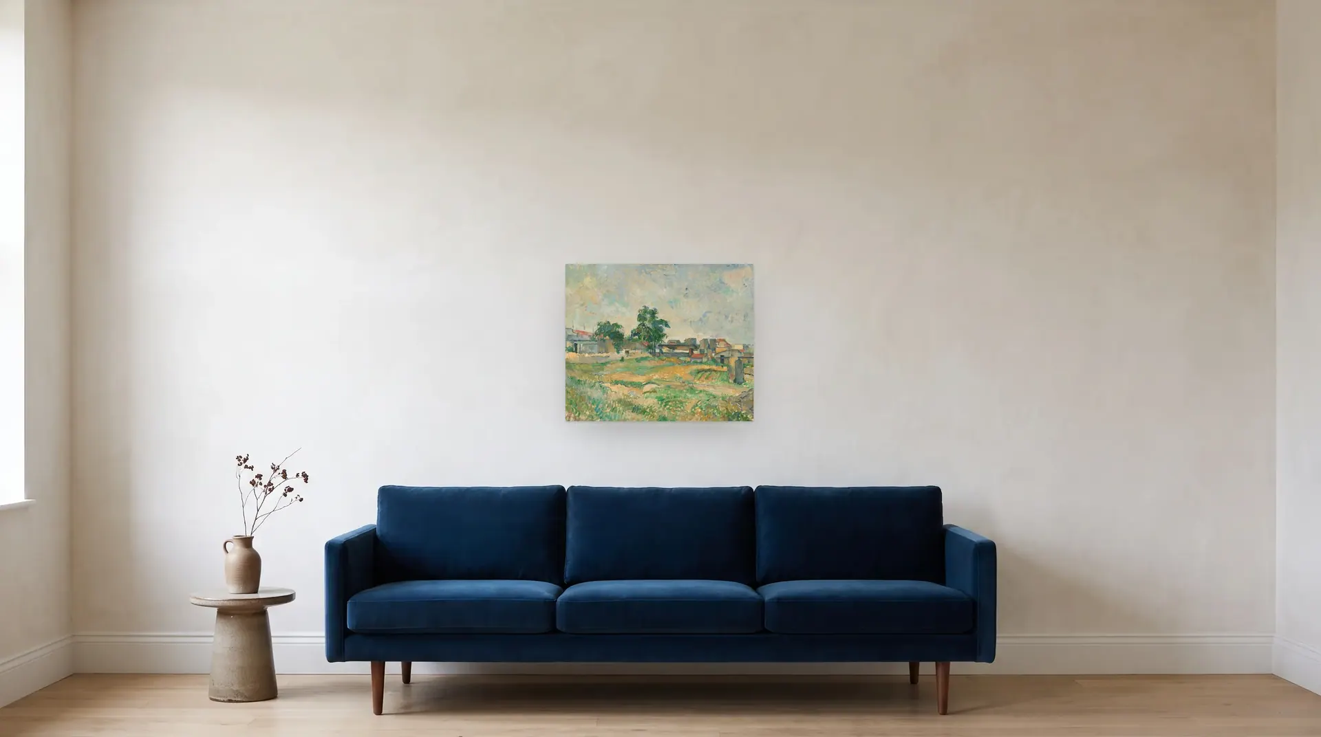 Landscape near Paris by Paul Cézanne shown at its true size, 23½" × 20", over an 84" sofa