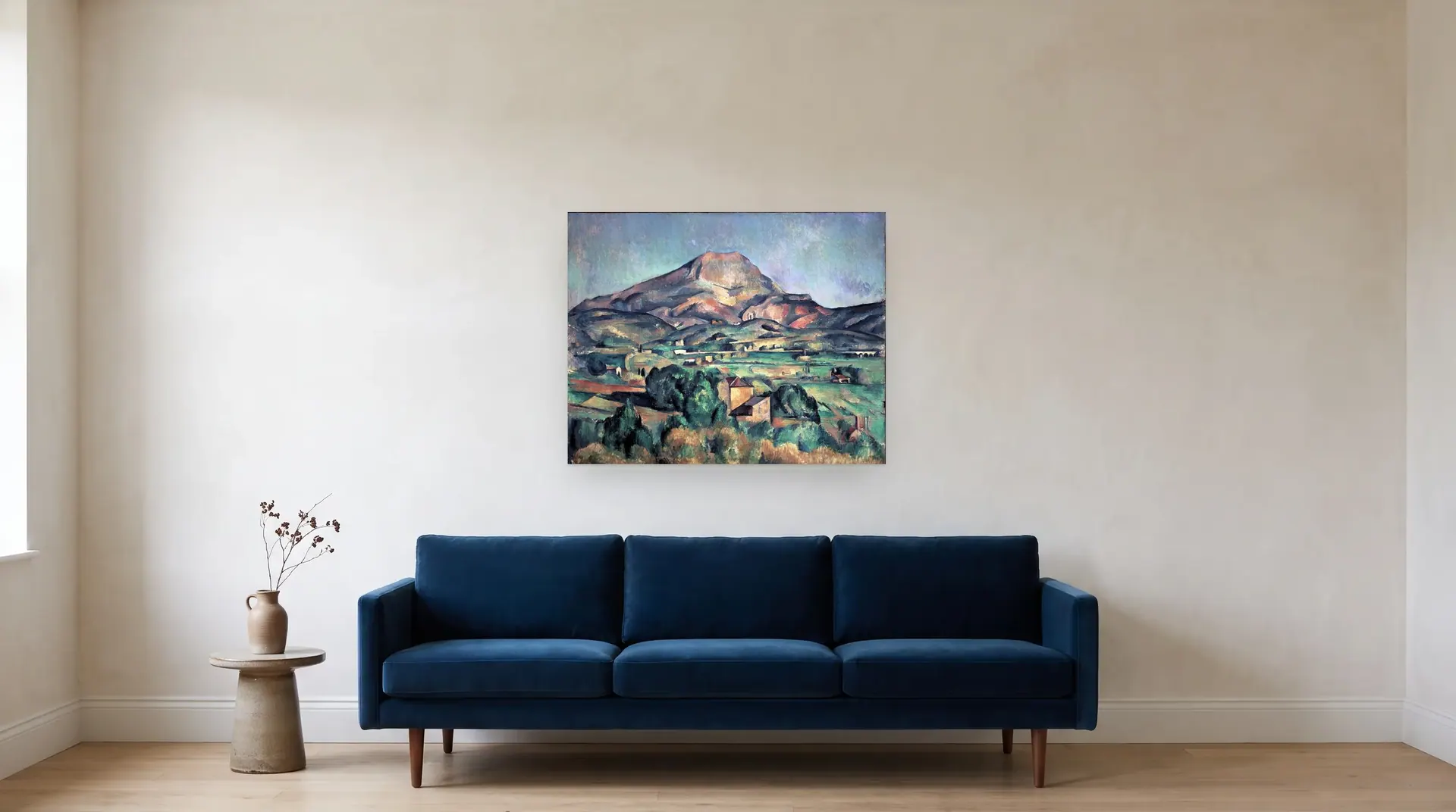 Mont Sainte-Victoire seen from Bellevue by Paul Cézanne shown at its true size, 36" × 28½", over an 84" sofa