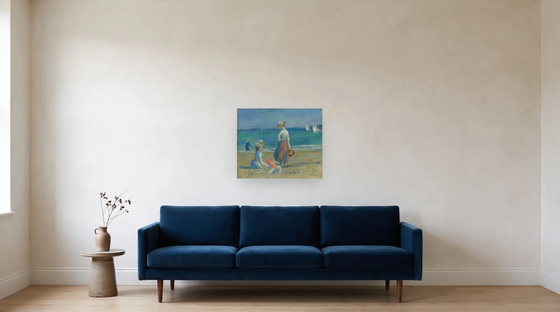 Figures on the Beach by Pierre-Auguste Renoir shown at its true size, 25" × 20½", over an 84" sofa