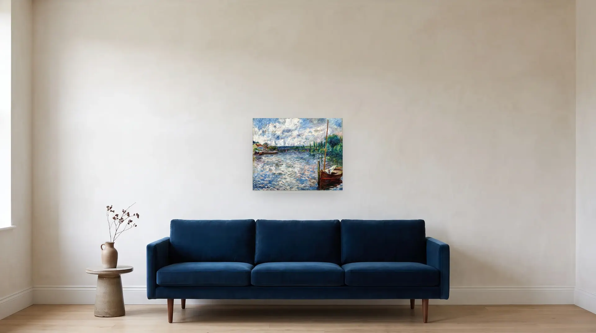 The Seine at Chatou by Pierre-Auguste Renoir shown at its true size, 25" × 20", over an 84" sofa
