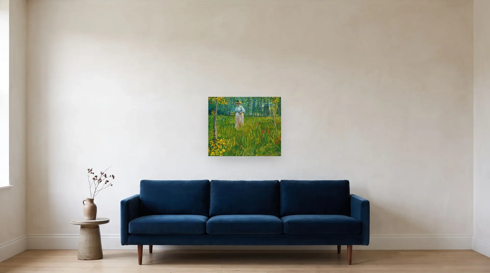 A Woman Walking in a Garden by Vincent van Gogh shown at its true size, 24½" × 20", over an 84" sofa