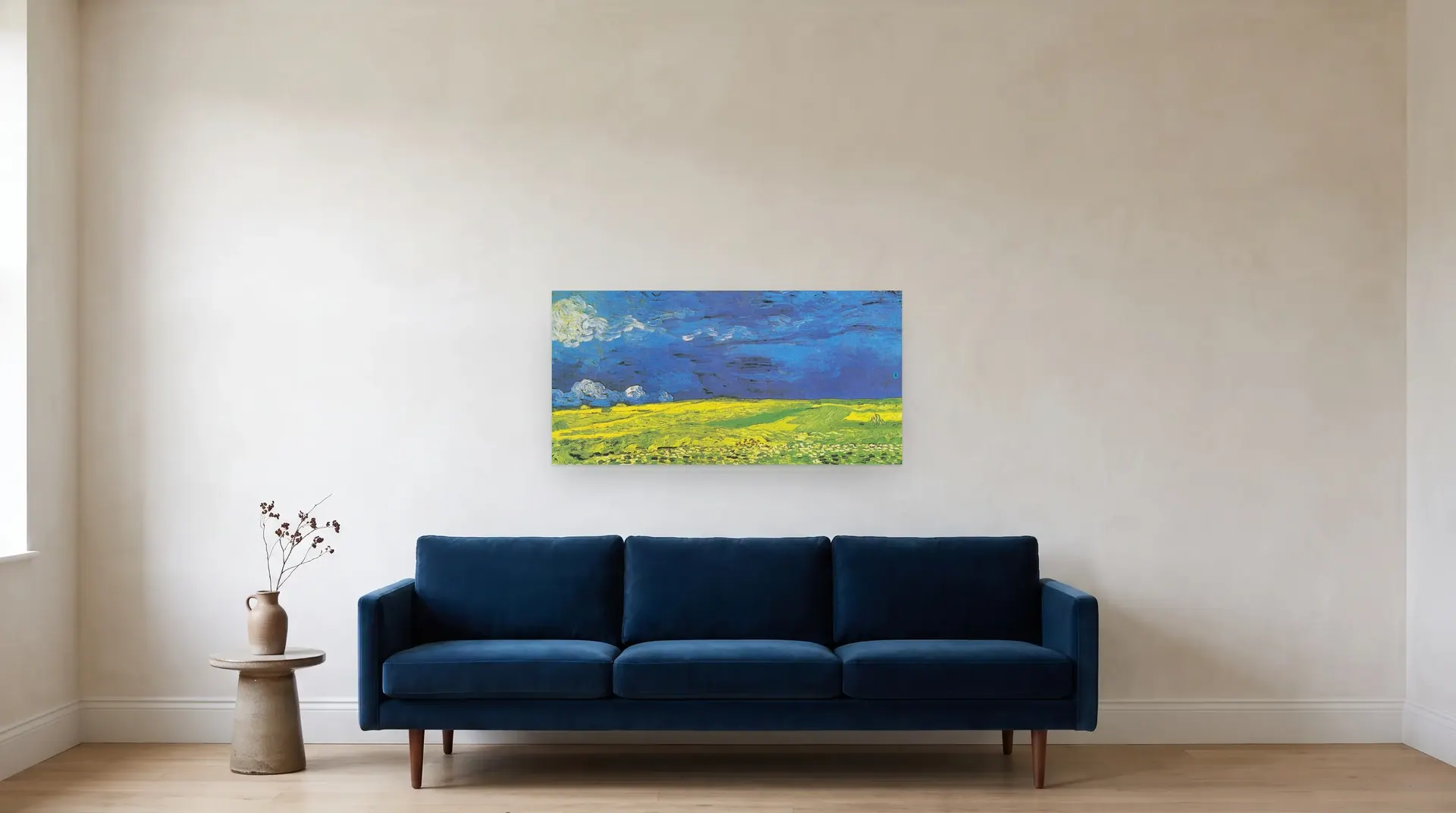 Wheatfield under Thunderclouds by Vincent van Gogh shown at its true size, 40" × 20", over an 84" sofa