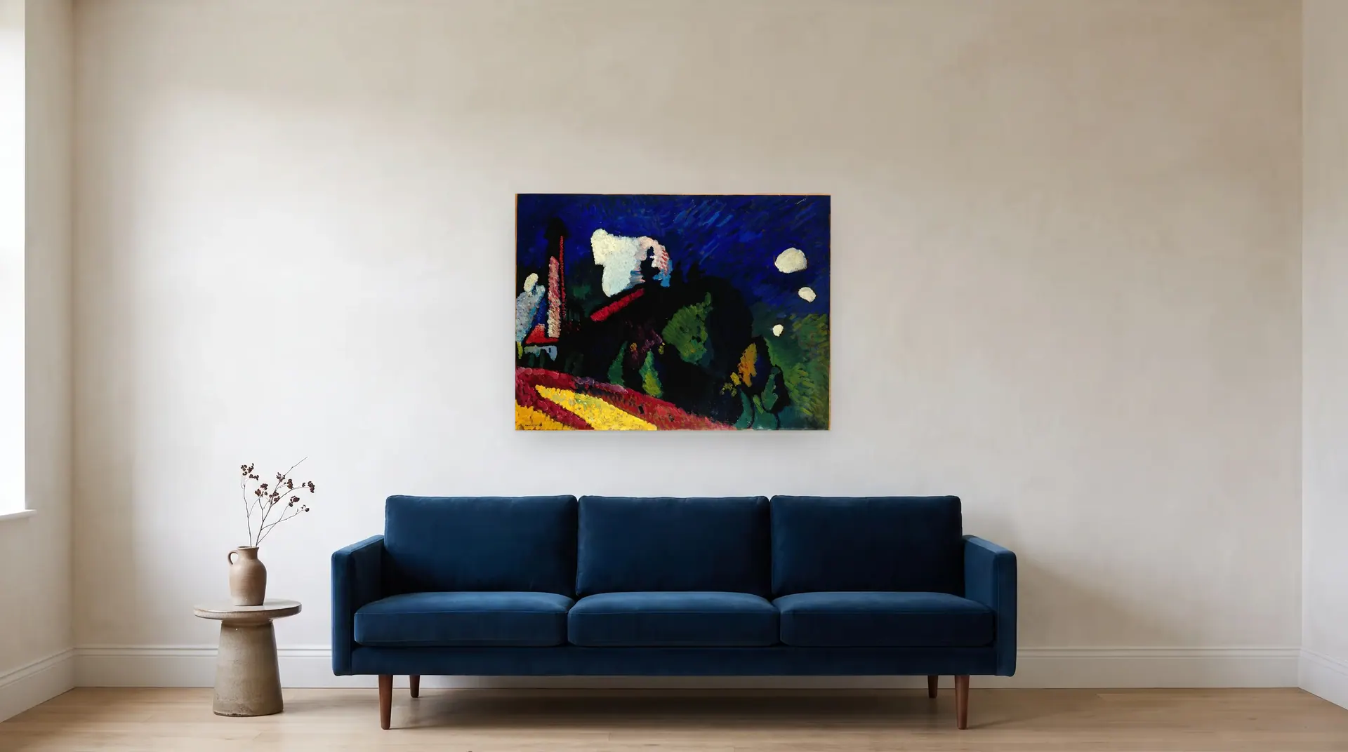 Murnau, Landscape with a Tower by Wassily Kandinsky shown at its true size, 39" × 29", over an 84" sofa